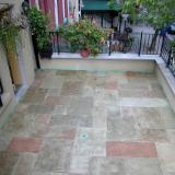 Cement patio treated with jewelstone